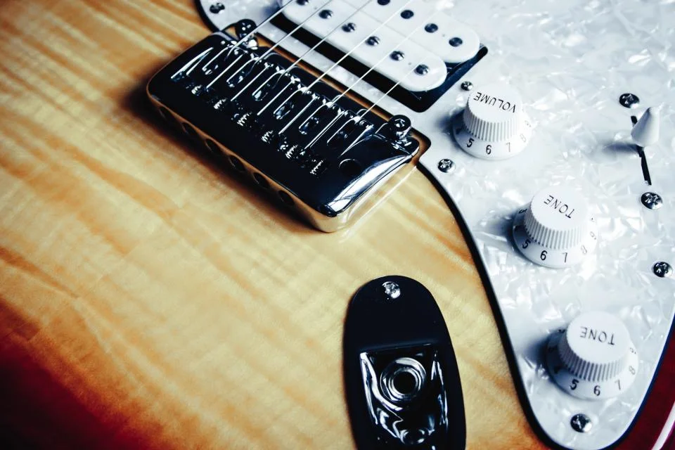 Sunburst electric guitar body and controls